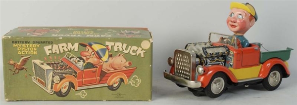 TIN LITHO BATTERY-OPERATED FARM TRUCK TOY.        