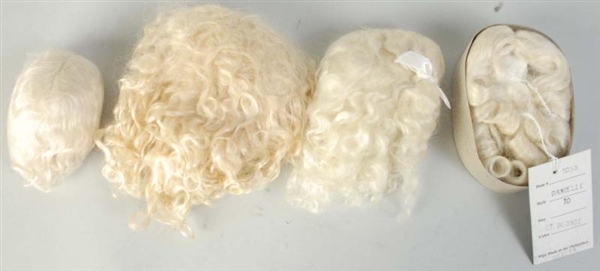 LOT OF 4: MOHAIR DOLL WIGS.                       
