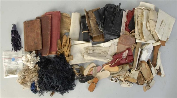 BOX OF LEATHER PIECES.                            