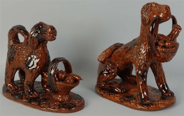 LOT OF 2: REDWARE POTTERY DOGS WITH BASKETS.      