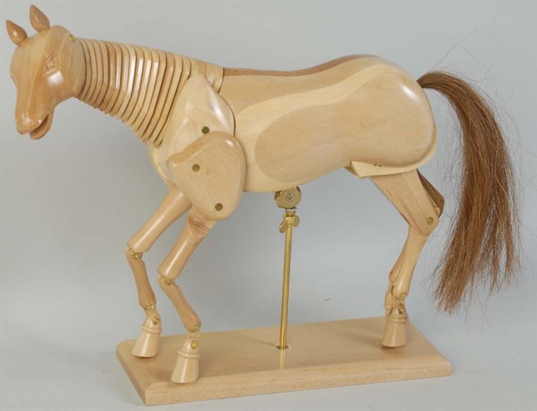 WOODEN JOINTED HORSE MODEL WITH ARTICULATED NECK. 