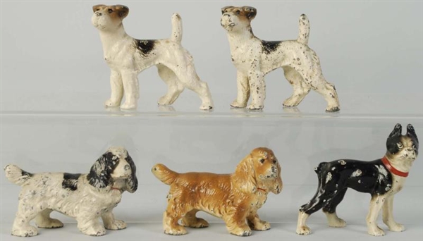 LOT OF 5: CAST IRON ASSORTED DOG PAPERWEIGHTS.    