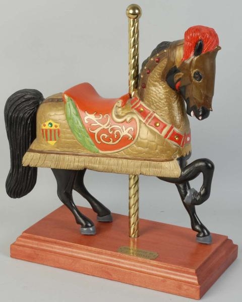 MINIATURE WOODEN CAROUSEL HORSE ON STAND.         