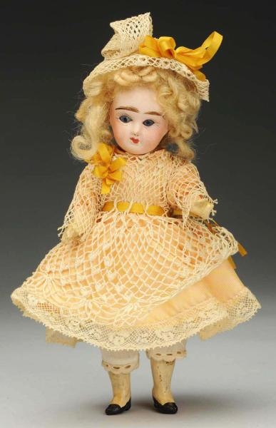 FRENCH BISQUE CHILD DOLL.                         