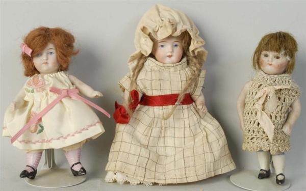 LOT OF 3: ALL BISQUE GIRL DOLLS.                  