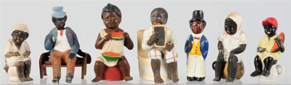 LOT OF 7: BISQUE & CHINA BLACK AMERICANA FIGURES. 