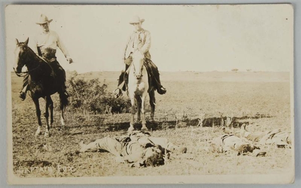 LAWMEN WITH DEAD OUTLAWS REAL PHOTO POSTCARD.     
