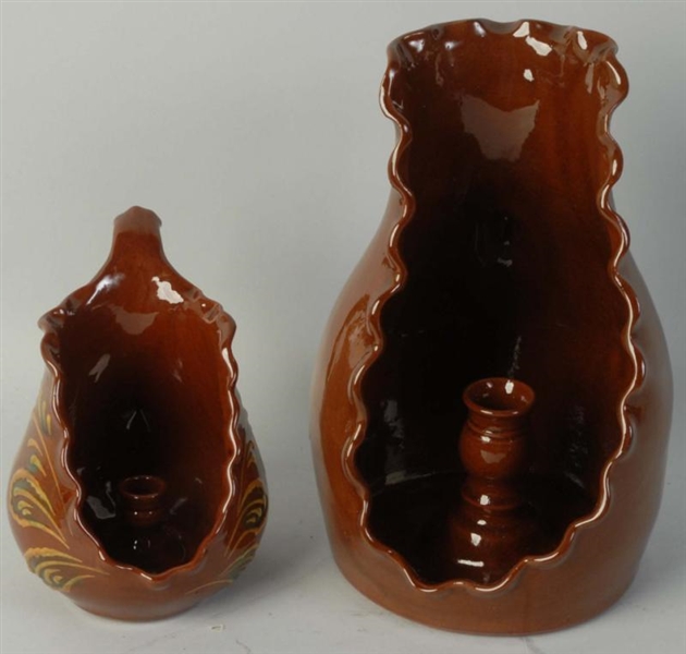 LOT OF 2: NED FOLTZ REDWARE CANDLE HOLDER .       