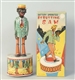 TIN BATTERY OPERATED STRUTTING SAM TOY.           