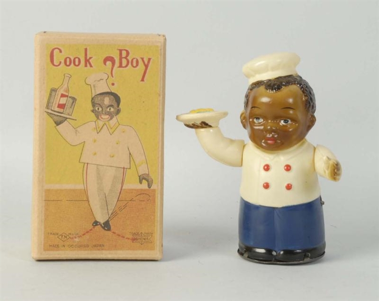 JAPANESE CELLULOID WIND-UP COOK BOY TOY.          