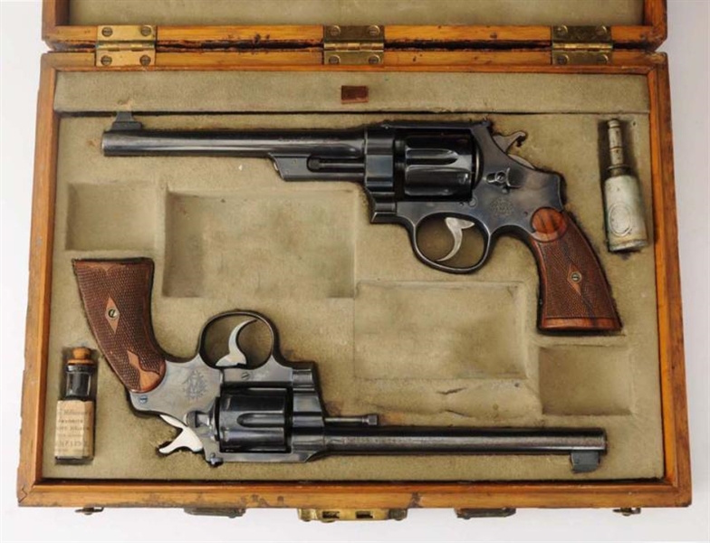 S&W AND COLT PISTOLS**.                           