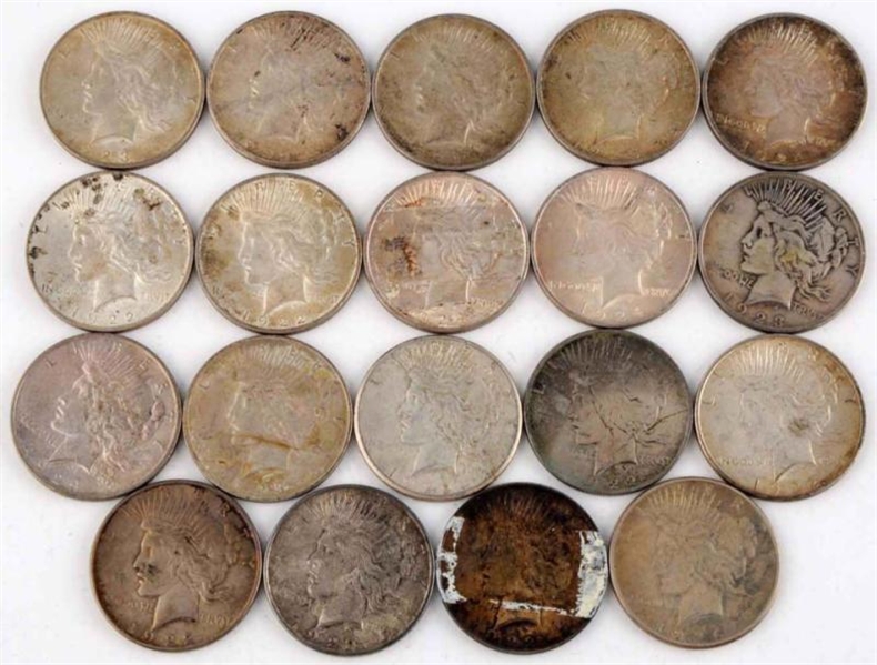 LOT OF 19: PEACE SILVER DOLLARS.                  