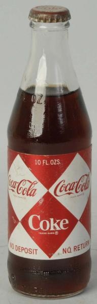 1960S COCA-COLA PAPER LABEL 10OZ. BOTTLE.         