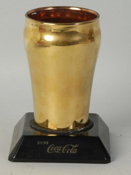 H.A. THOMPSON COCA-COLA GOLD GLASS & STAND.       