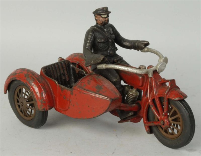 CAST IRON MOTORCYCLE WITH SIDE CAR.               
