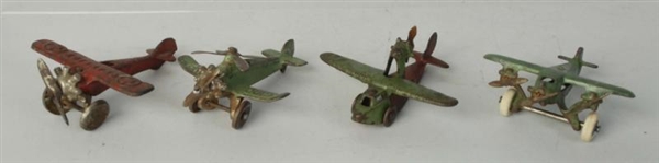 LOT OF 4: CAST IRON AIRPLANE TOYS.                