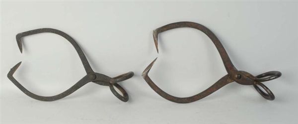 PAIR OF VINTAGE CAST IRON TONGS.                  