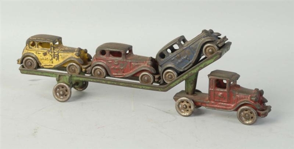 CAST IRON HUBLEY AUTO CARRIER TOY.                