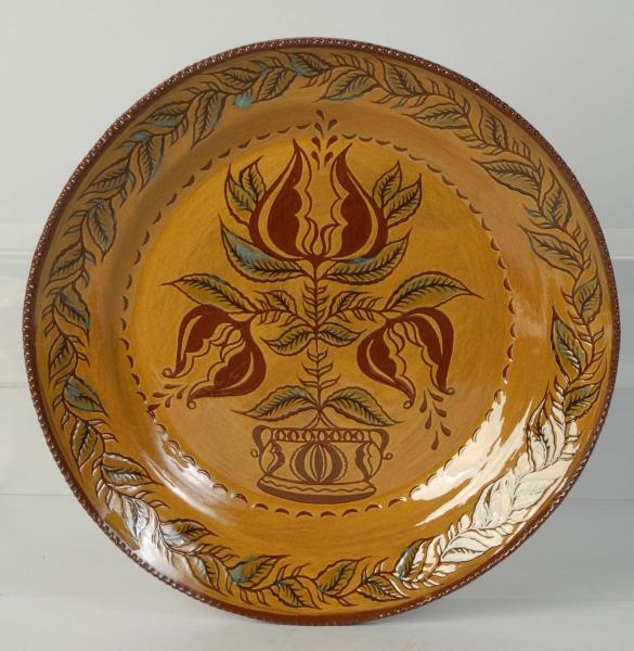 LARGE NED FOLTZ REDWARE POTTERY PLATE.            