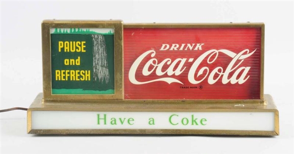 1950S COCA-COLA WATERFALL LIGHTED COUNTER SIGN.   