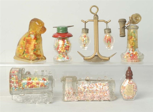 LOT OF 7: GLASS CANDY CONTAINERS.                 