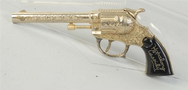 HOPALONG CASSIDY GOLD CAP GUN.                    