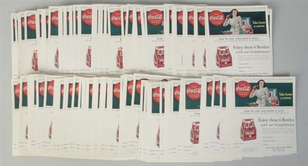 STACK OF COCA-COLA COUPONS.                       