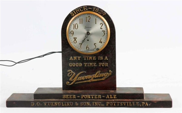 1920S-30S CAST IRON YUENGLINGS COUNTER CLOCK.     