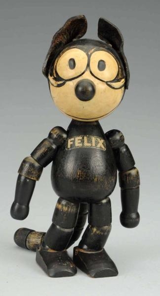 NIFTY WOOD JOINTED FELIX TOY.                     