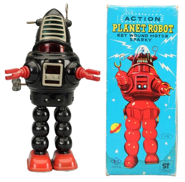PAINTED TIN & PLASTIC WIND-UP ACTION PLANET ROBOT 