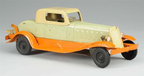 GIRARD PRESSED STEEL WIND-UP COUPE.               