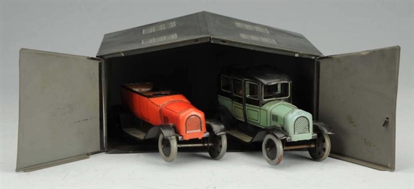 GERMAN BING GARAGE WITH 2 WIND-UP AUTOS.          