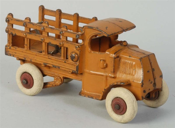 CAST IRON HUBLEY STAKE TRUCK.                     