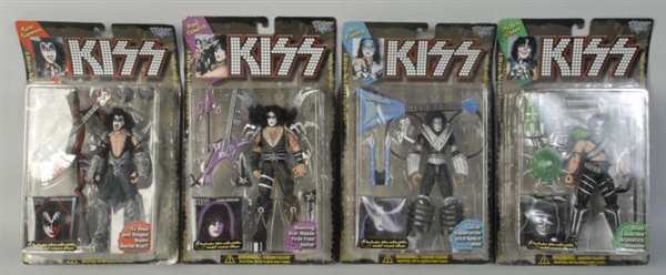 LOT OF 4: SMALL KISS FIGURES.                     