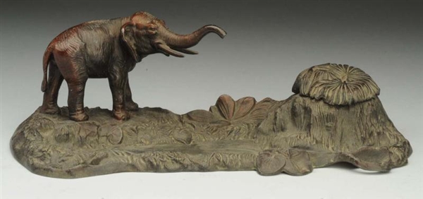 METAL INKWELL ELEPHANT WITH JUNGLE.               