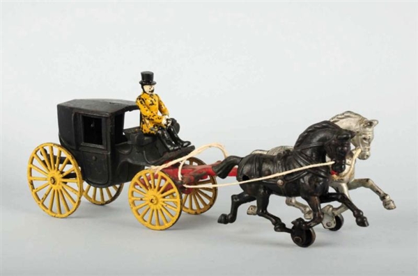 CAST IRON HUBLEY TWO HORSE DRAWN CAB.             