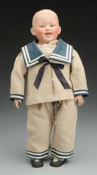 SMILING HEUBACH CHARACTER DOLL.                   