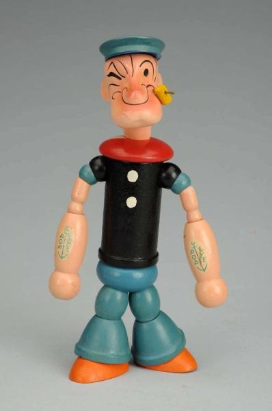 CHIEN COMPOSITION AND WOOD-JOINTED POPEYE FIGURE. 