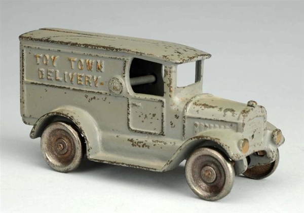 CAST IRON TOY TOWN DELIVERY TRUCK.                