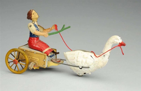 GERMAN STOCK TIN LITHO WIND-UP WOMAN & GOOSE TOY. 