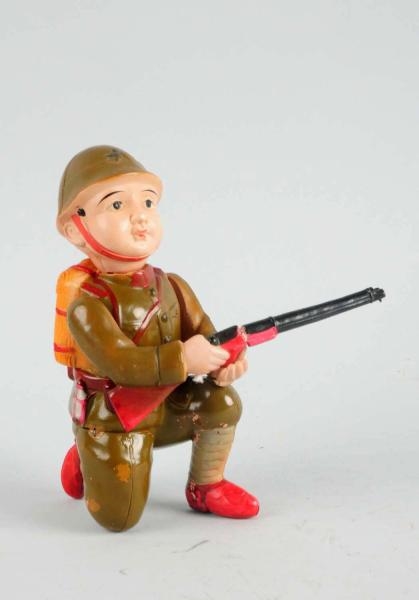CELLULOD WIND-UP DOUGHBOY SOLDIER.                