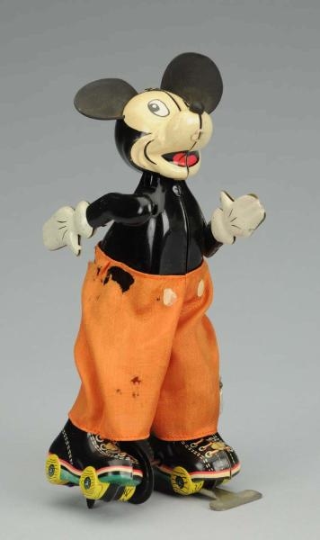 LINEMAR TIN WIND-UP MICKEY MOUSE SKATER TOY.      