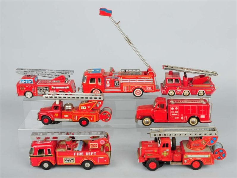 LOT OF 7: JAPANESE FRICTION FIRE ENGINE TOYS.     