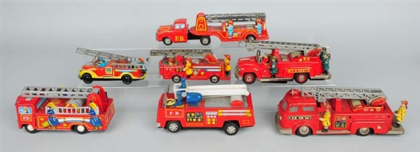 LOT OF 7: JAPANESE FRICTION FIRE TRUCKS.          