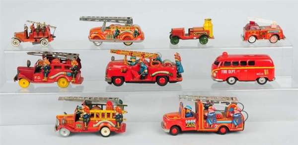 LOT OF 9: TIN LITHO FIRE TRUCK TOYS.              