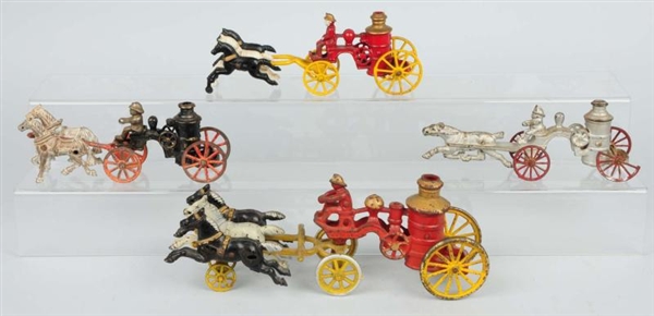 LOT OF 4: CAST IRON HORSE DRAWN FIRE TOYS.        
