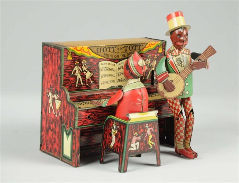 STRAUSS TIN LITHO WIND-UP HOTT & TOTT BAND TOY.   