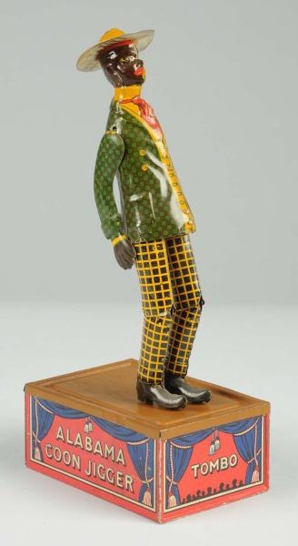 STRAUSS TIN LITHO WIND-UP TOMBO DANCING TOY.      