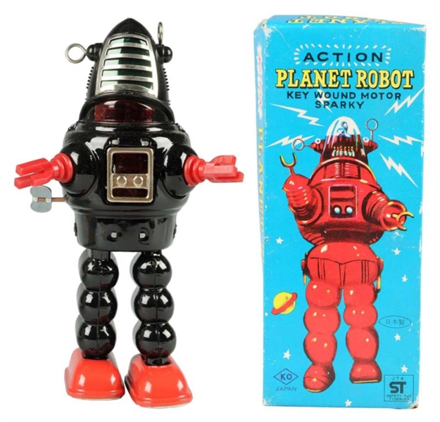 JAPANESE WIND-UP PLANET ROBOT.                    