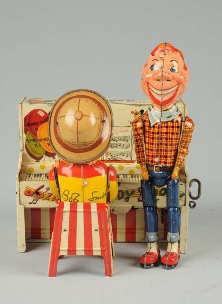 UNIQUE ART TIN LITHO WIND-UP HOWDY DOODY BAND.    